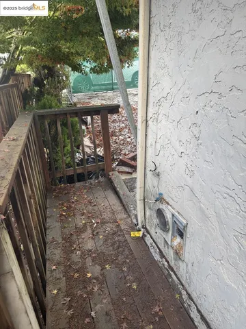 a view of a pathway both side of the house