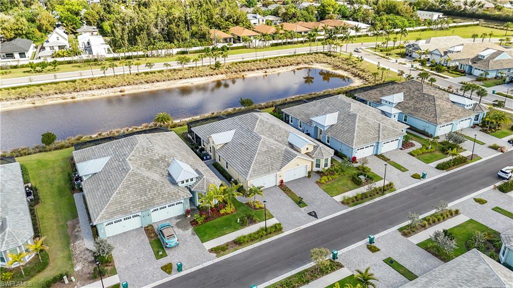 8781 Yucatan Court Naples, FL 34113 - Photo 2 of 36 an aerial view of a house with a ocean view