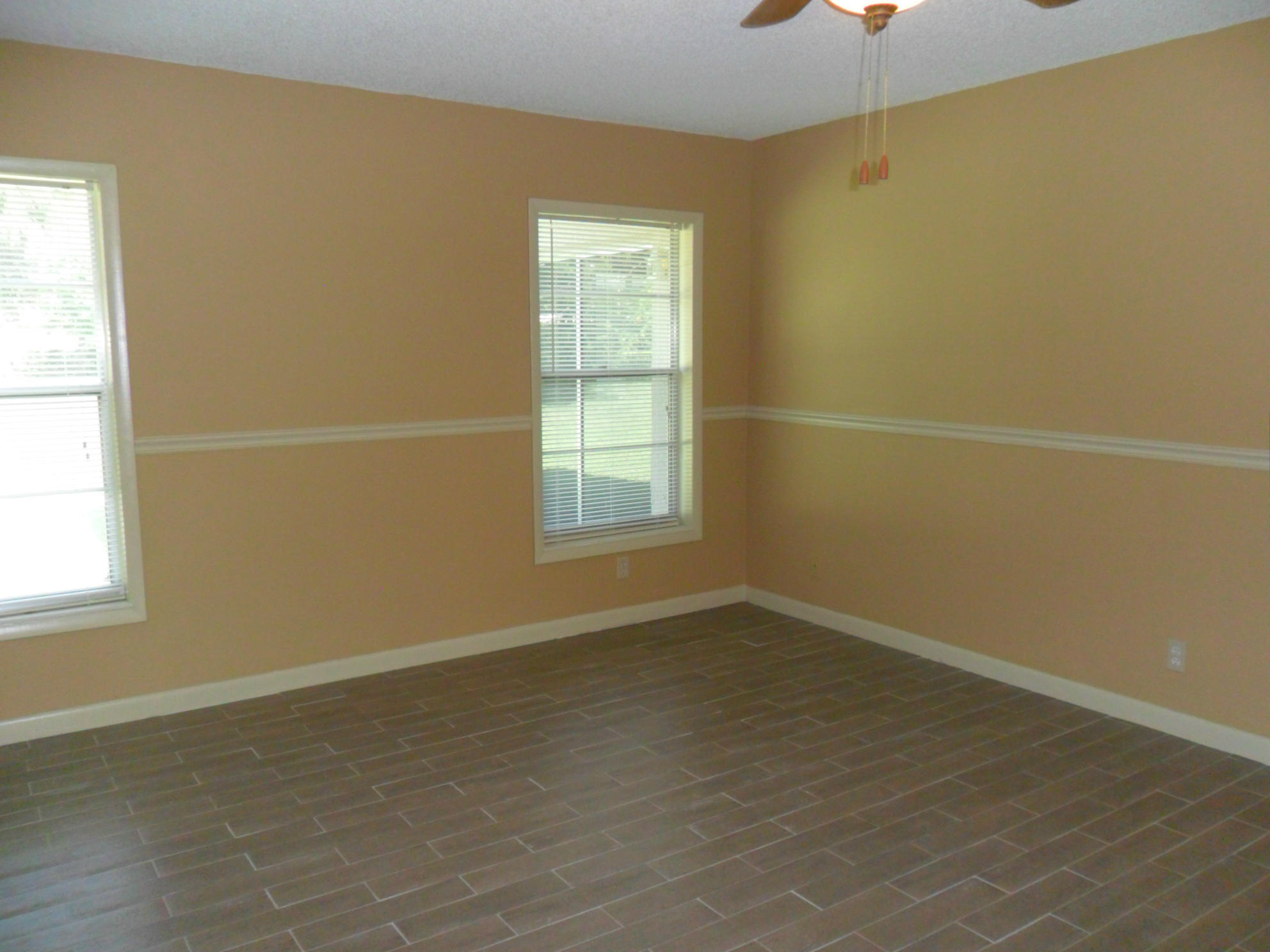 6311 Lasalle Road Delray Beach, FL 33484 - Photo 23 of 34 an empty room with a window