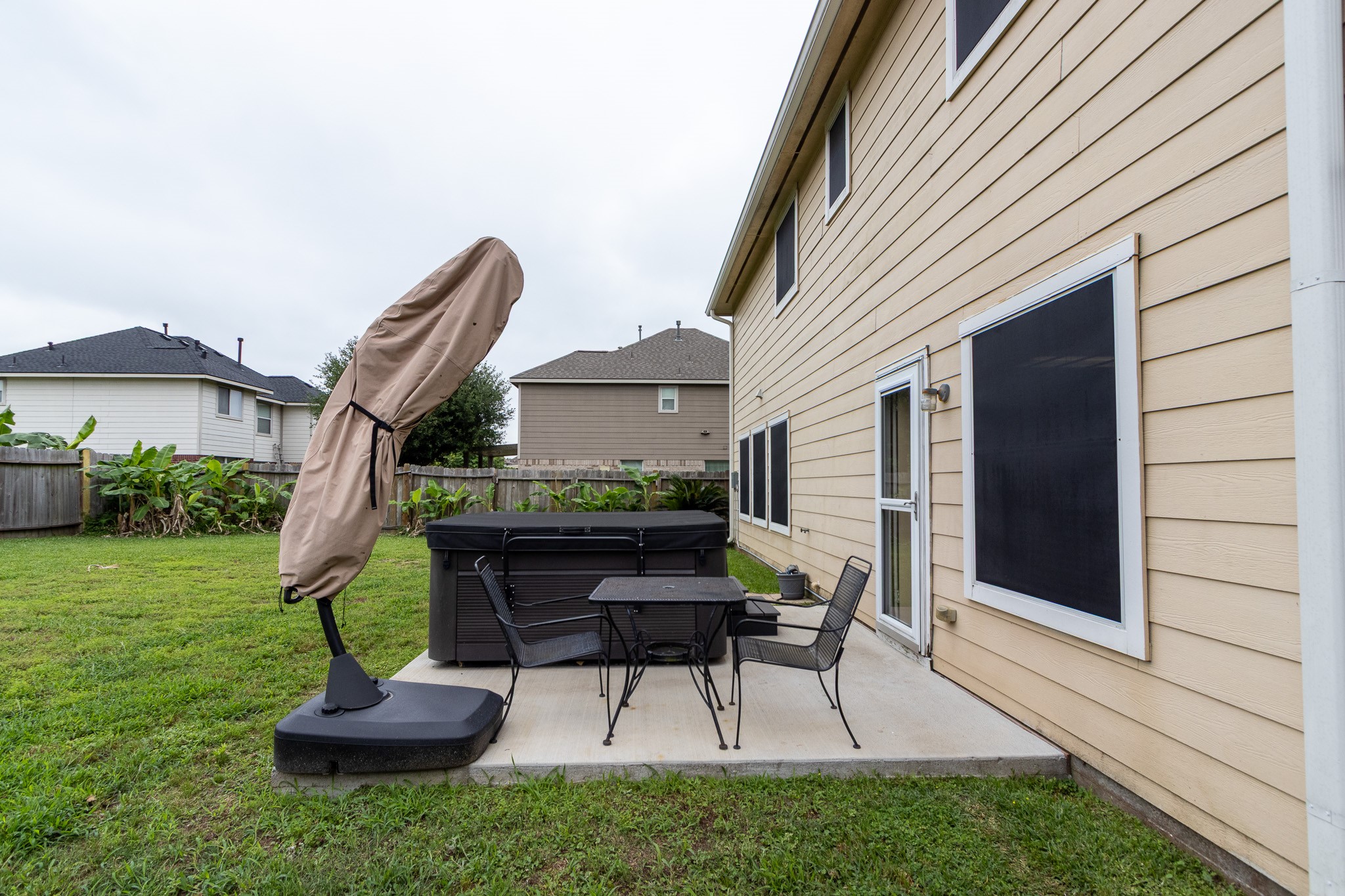 921 Sage Street Baytown, TX 77521 - Photo 33 of 38 Inviting Patio w/Hot Tub