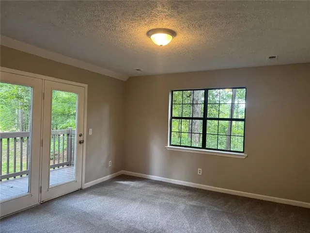 an empty room with windows