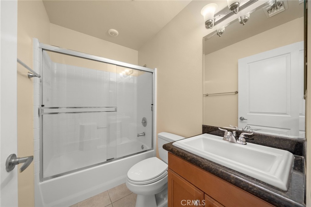 1500 Pine Avenue, Unit 9 Long Beach, CA 90813 - Photo 15 of 30 a bathroom with a sink toilet and shower