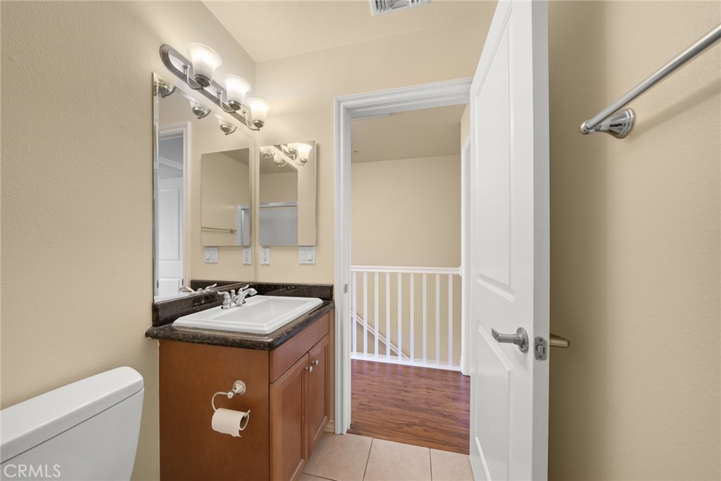1500 Pine Avenue, Unit 9 Long Beach, CA 90813 - Photo 16 of 30 a bathroom with a sink a toilet and shower