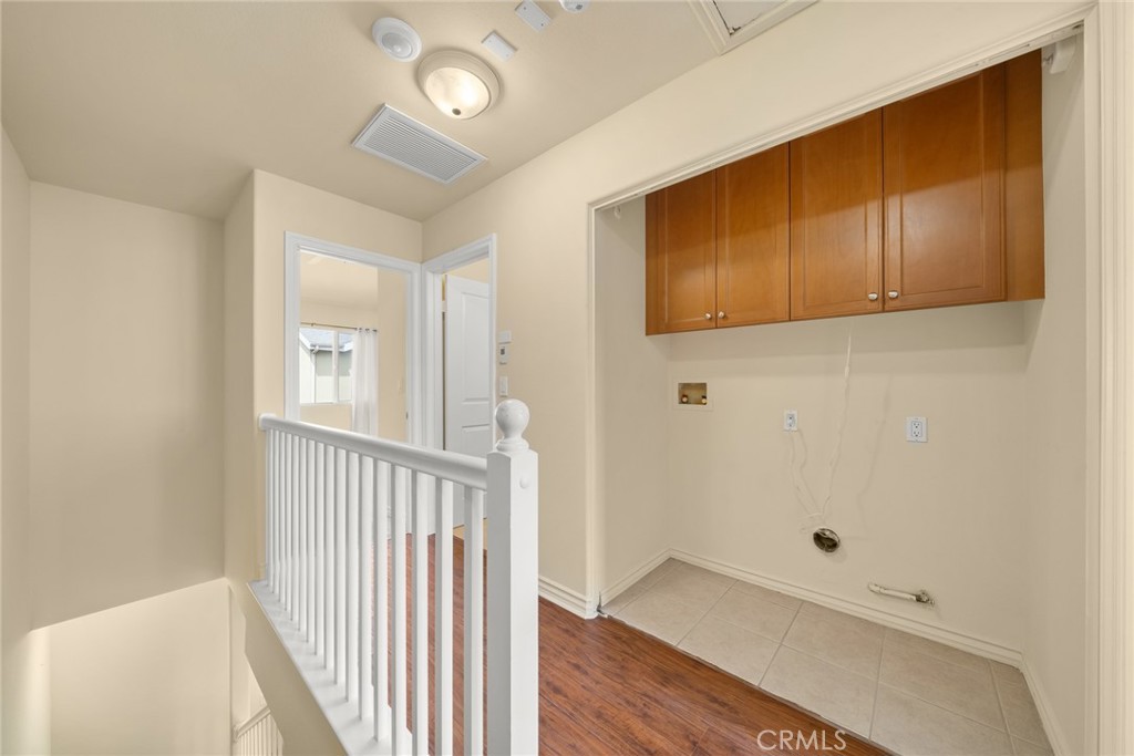 1500 Pine Avenue, Unit 9 Long Beach, CA 90813 - Photo 9 of 30 a view of a hallway with wooden floor and entryway