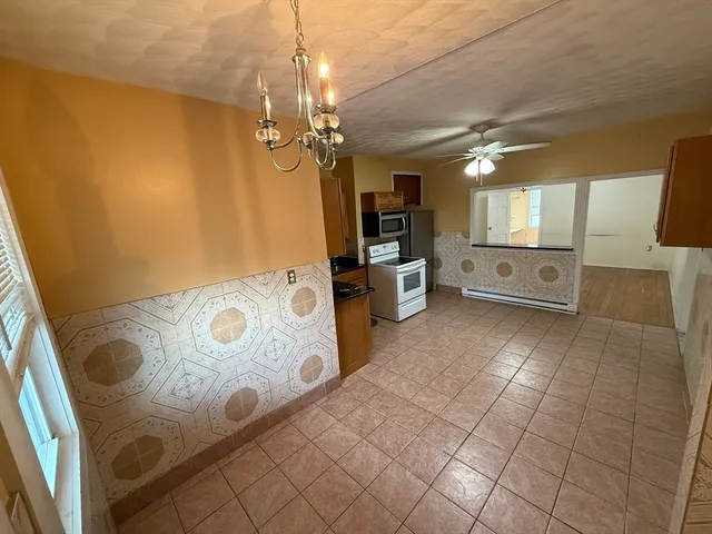 a view of a kitchen with windows