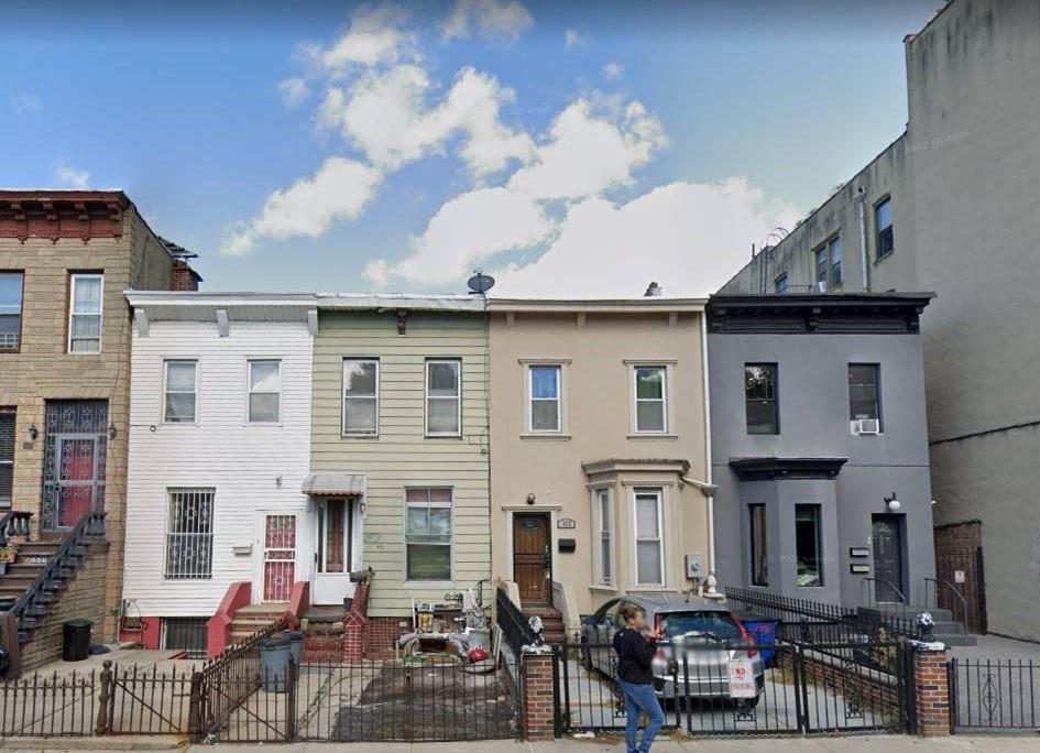a view of a house with sitting area