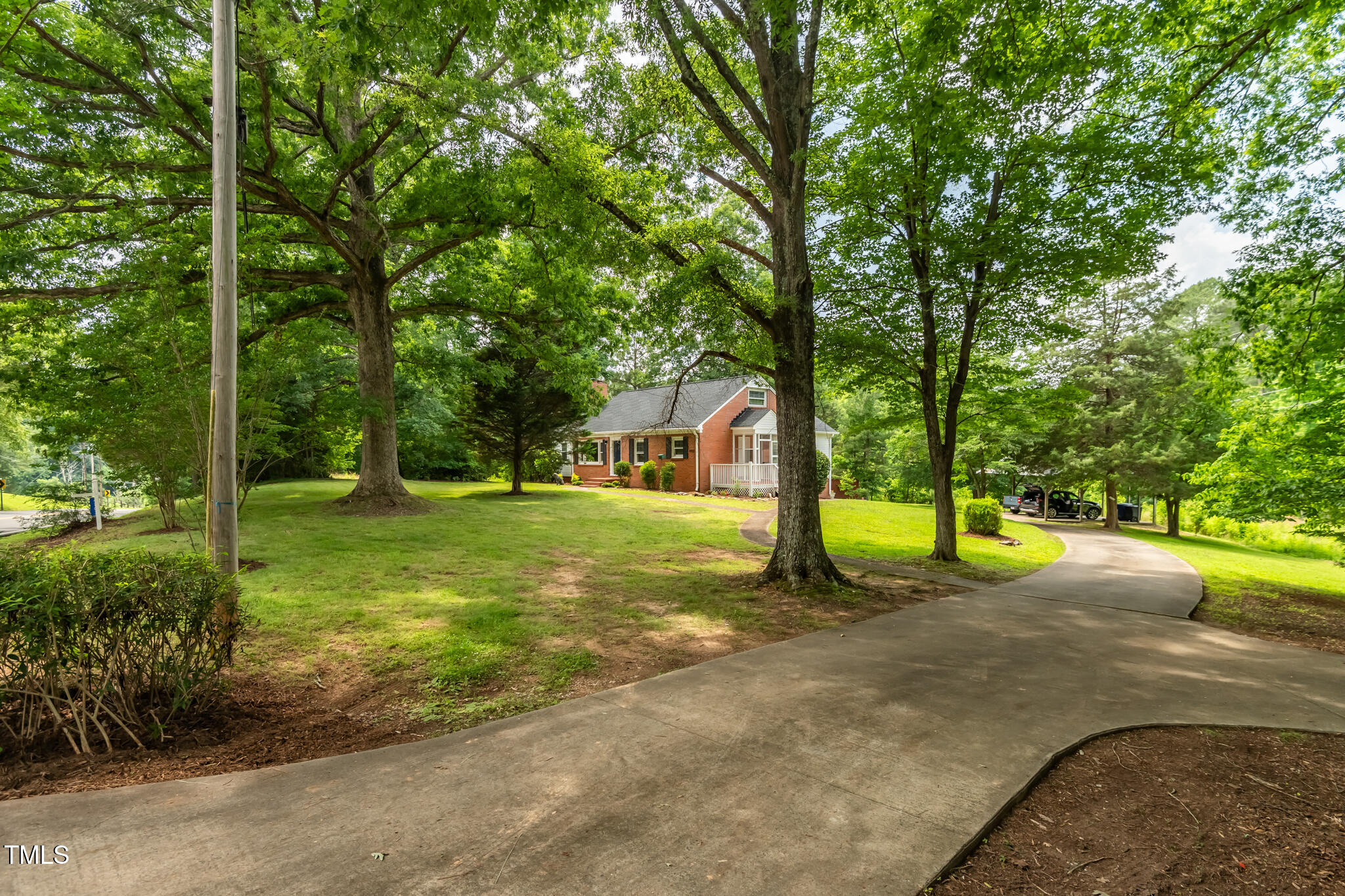 4703 Pleasant Green Road Durham, NC 27705 - Photo 37 of 56 Concrete Driveway with Turnaround