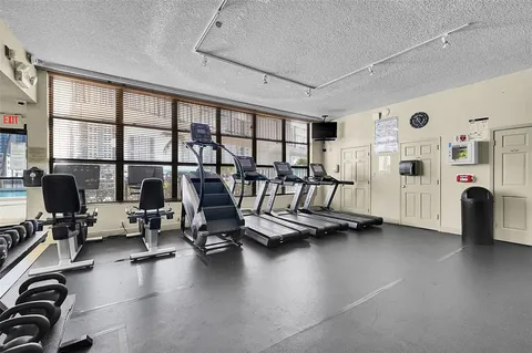 a view of a room with gym equipment