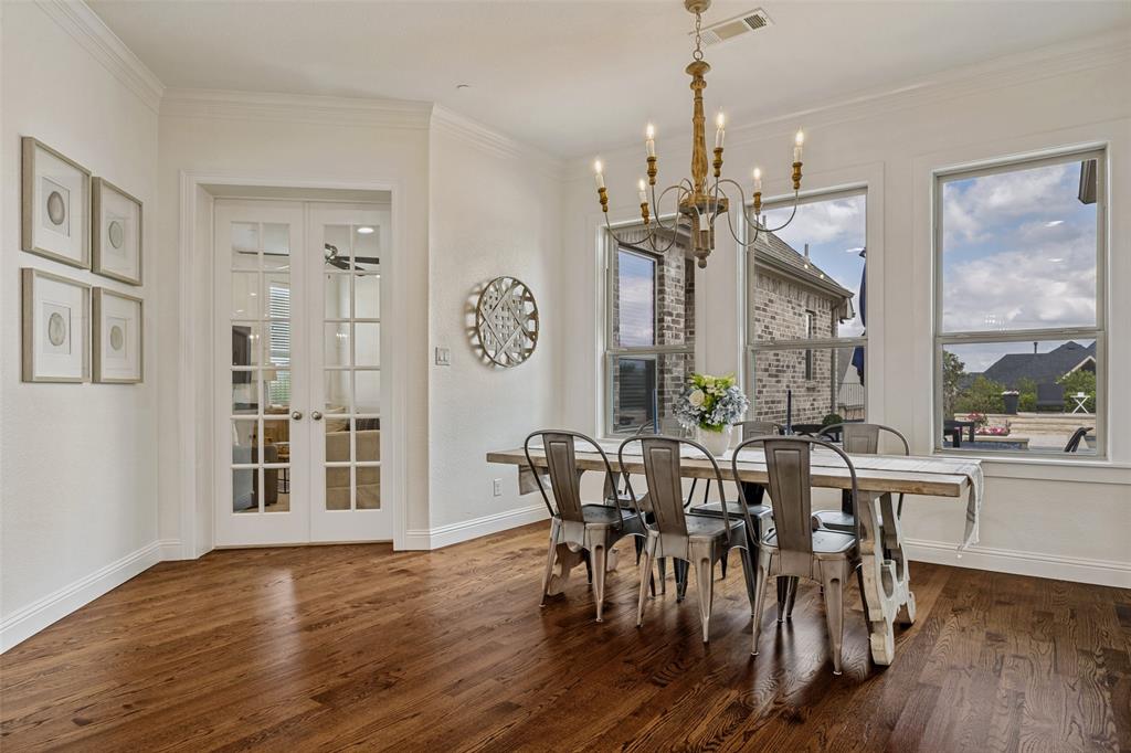 641 Maggie Trail Lucas, TX 75002 - Photo 15 of 37 a view of a dining room with furniture window and wooden floor