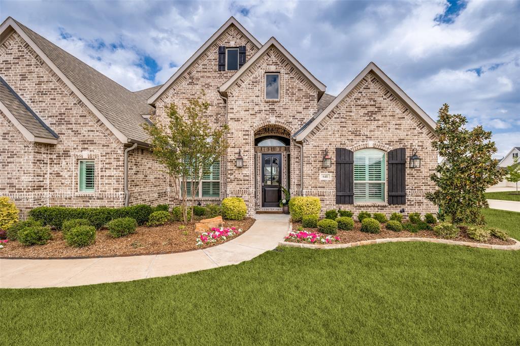 641 Maggie Trail Lucas, TX 75002 - Photo 2 of 37 a front view of a house with garden