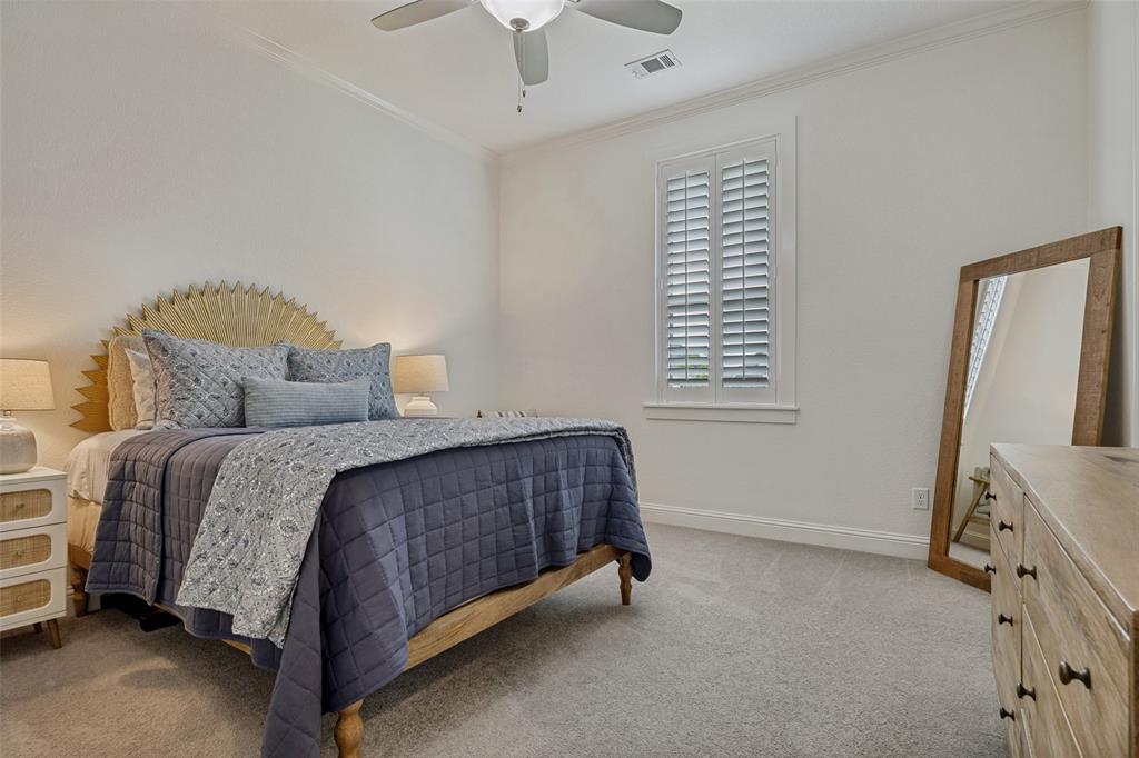 641 Maggie Trail Lucas, TX 75002 - Photo 24 of 37 a bedroom with a bed and a tv