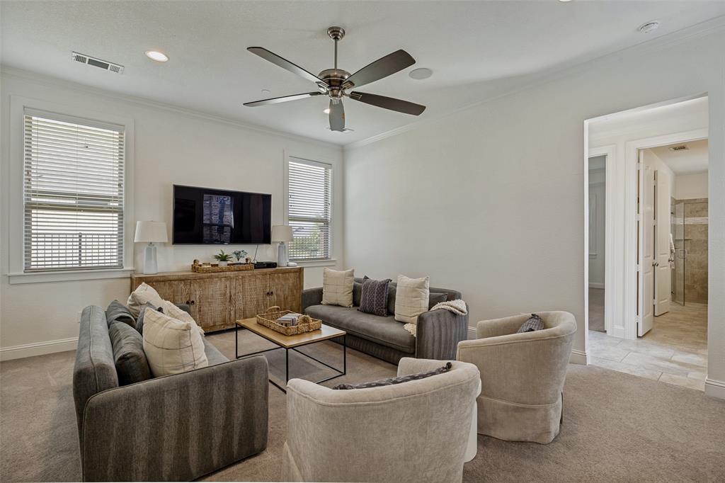 641 Maggie Trail Lucas, TX 75002 - Photo 26 of 37 a living room with furniture and a flat screen tv