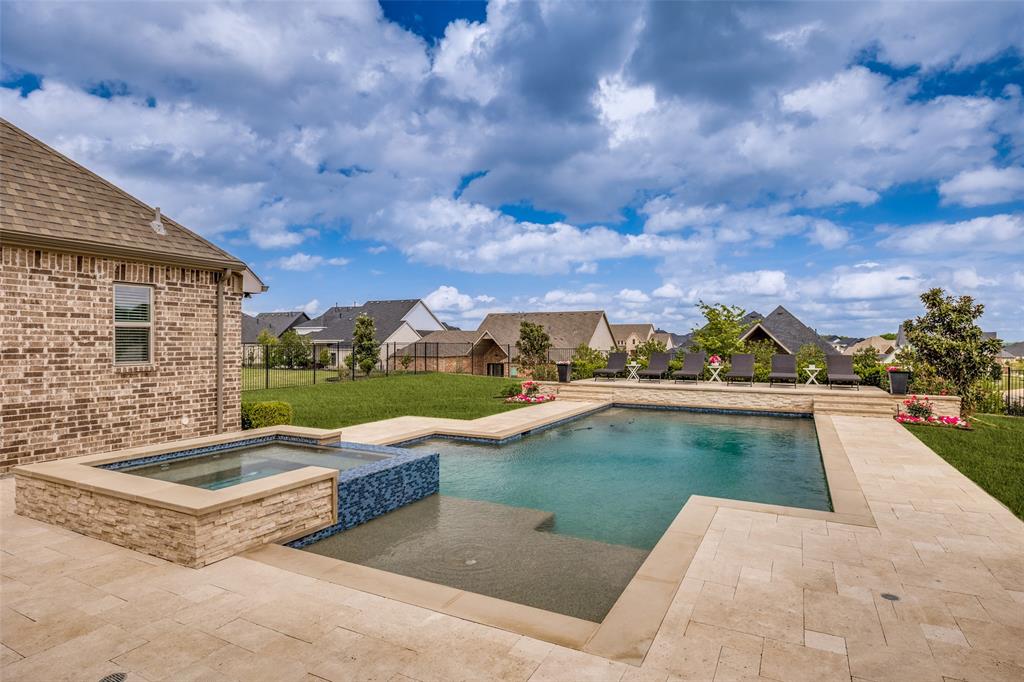 641 Maggie Trail Lucas, TX 75002 - Photo 30 of 37 a view of swimming pool with outdoor seating and city view