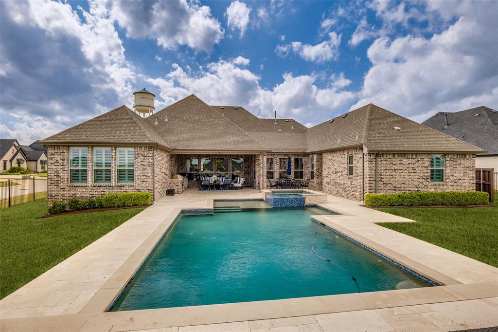 641 Maggie Trail Lucas, TX 75002 - Photo 32 of 37 a front view of a house with garden