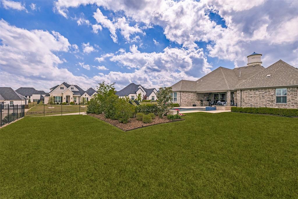 641 Maggie Trail Lucas, TX 75002 - Photo 35 of 37 a front view of a house with garden
