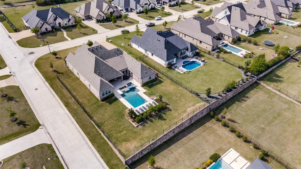641 Maggie Trail Lucas, TX 75002 - Photo 36 of 37 an aerial view of residential houses with outdoor space