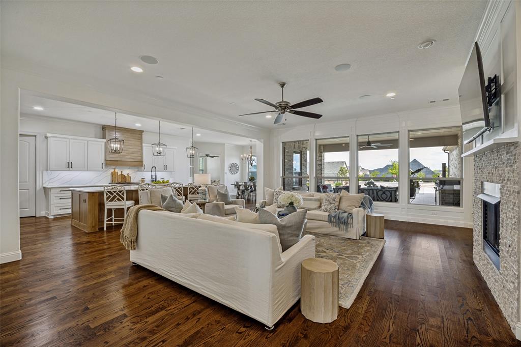 641 Maggie Trail Lucas, TX 75002 - Photo 7 of 37 a living room with furniture and a large window