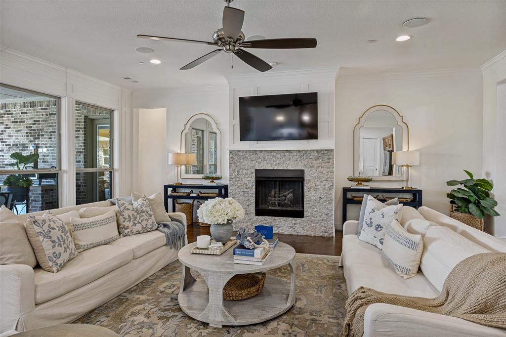 641 Maggie Trail Lucas, TX 75002 - Photo 9 of 37 a living room with furniture and a fireplace