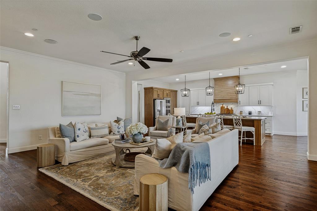 641 Maggie Trail Lucas, TX 75002 - Photo 10 of 37 a living room with furniture kitchen view and a wooden floor