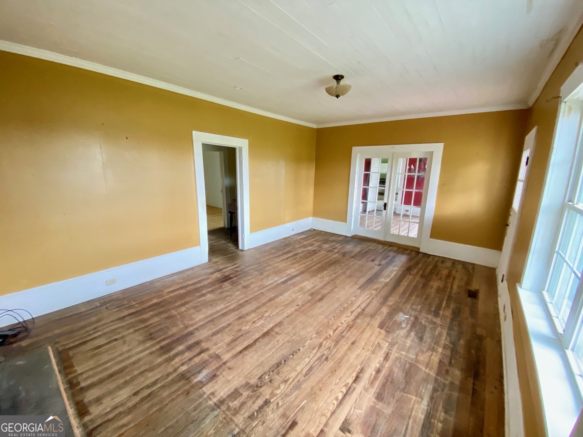 1088 Tippettville Road Pineview, GA 31071 - Photo 7 of 33 a view of empty room with wooden floor