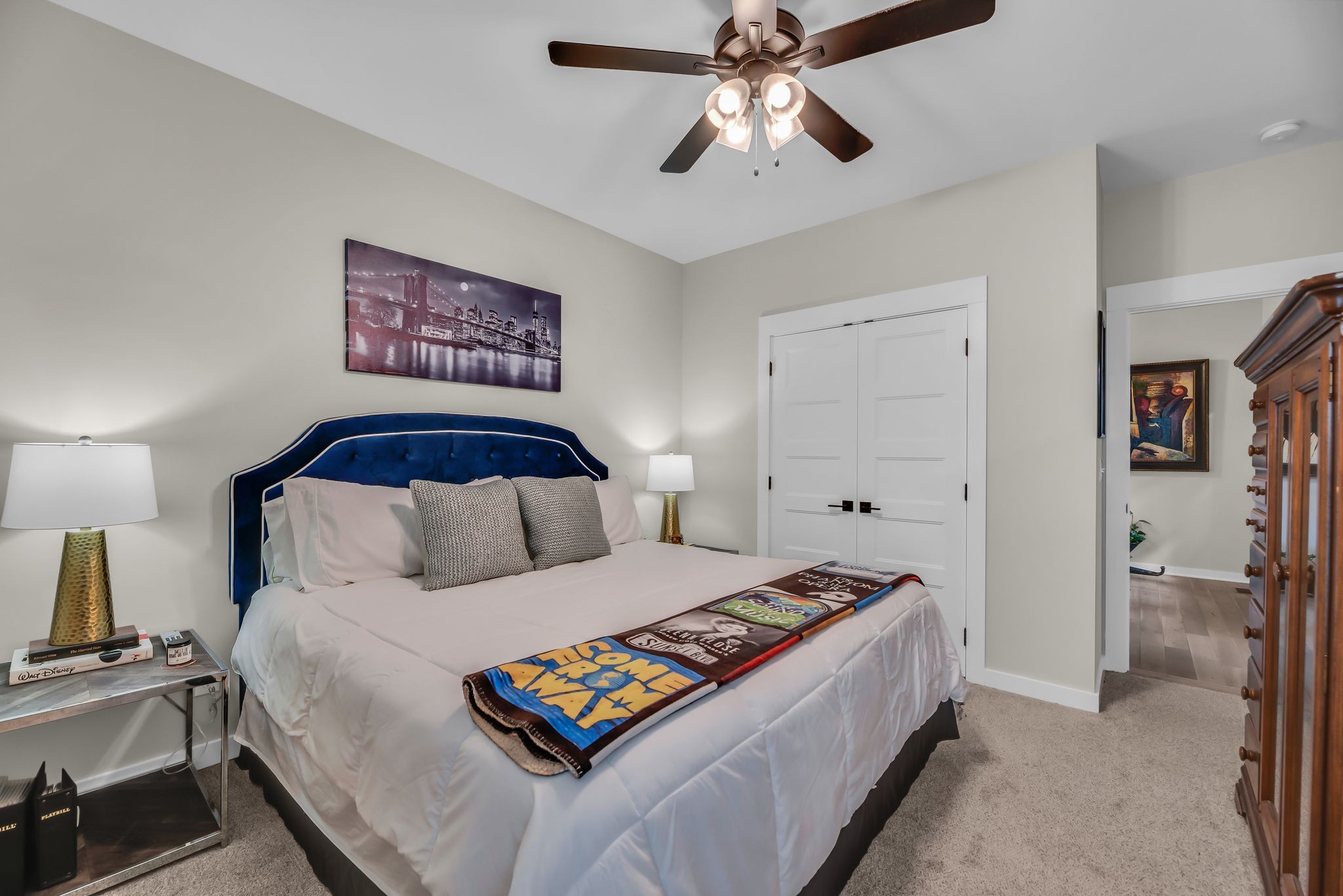 120 Augusta Trail Springfield, TN 37172 - Photo 12 of 37 a bedroom with a bed and a chandelier