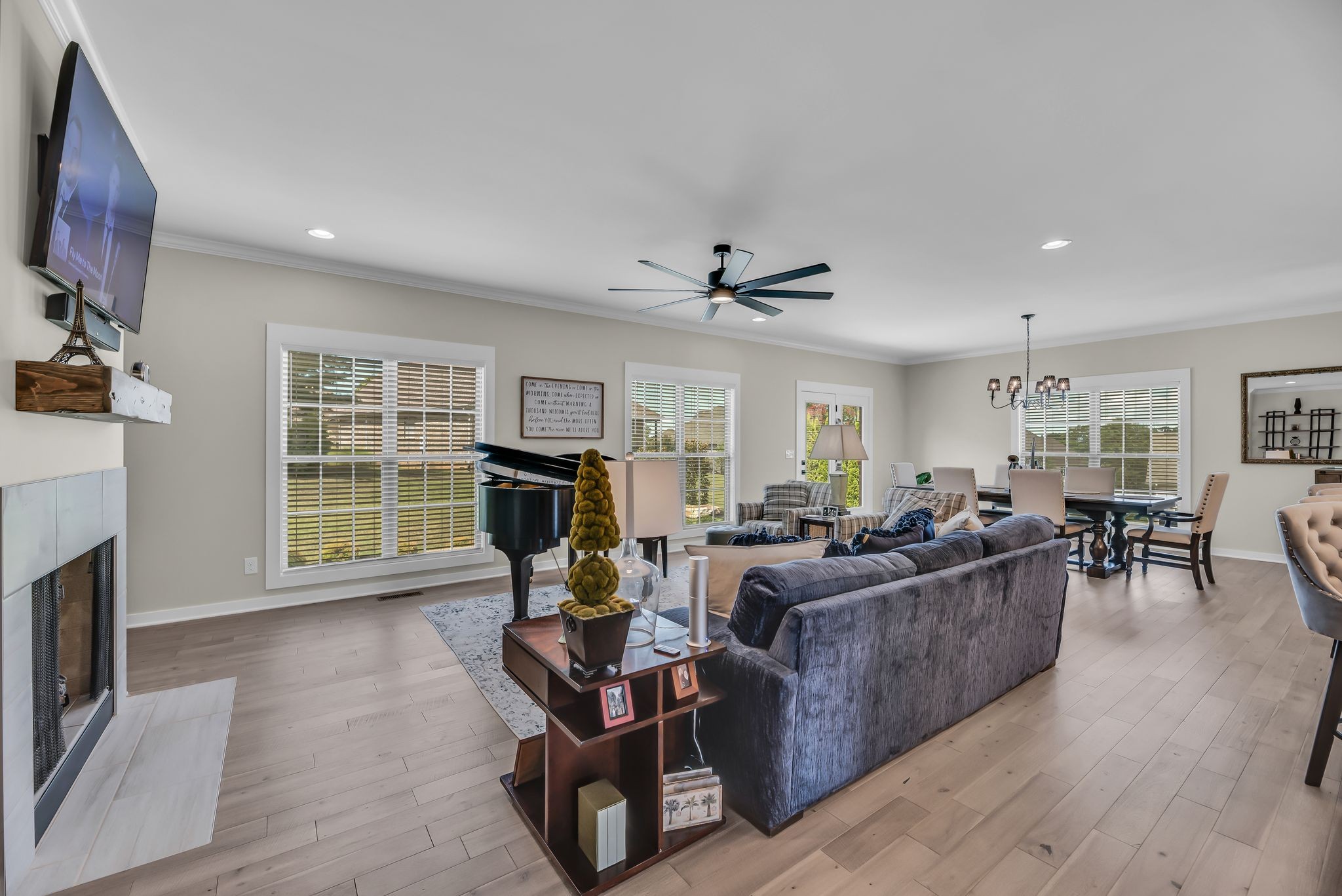 120 Augusta Trail Springfield, TN 37172 - Photo 13 of 37 a living room with furniture a fireplace and a flat screen tv