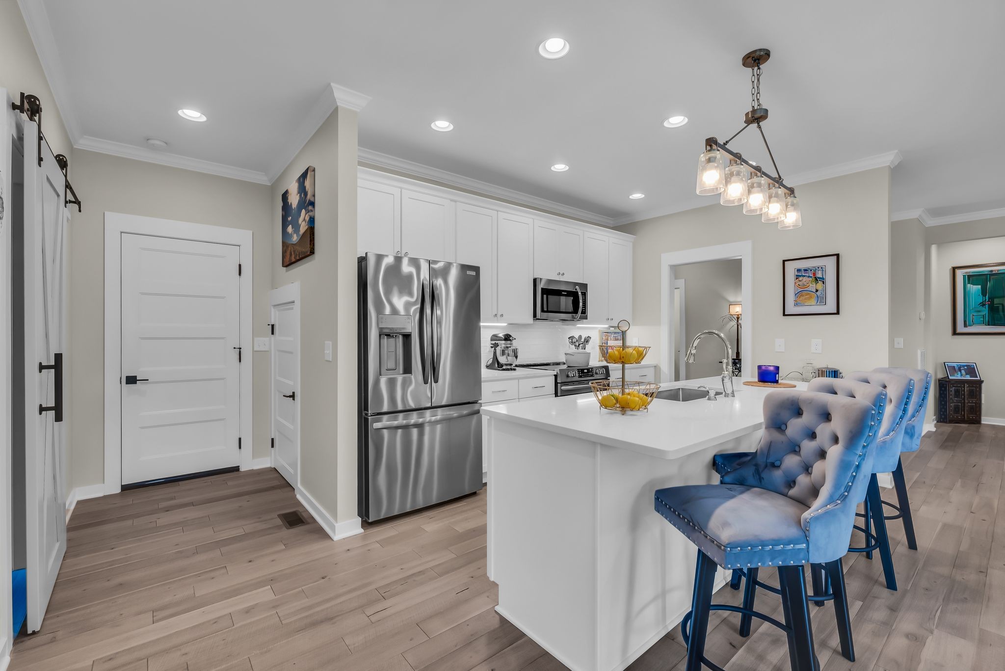 120 Augusta Trail Springfield, TN 37172 - Photo 20 of 37 a kitchen with stainless steel appliances kitchen island granite countertop a refrigerator and a stove top oven