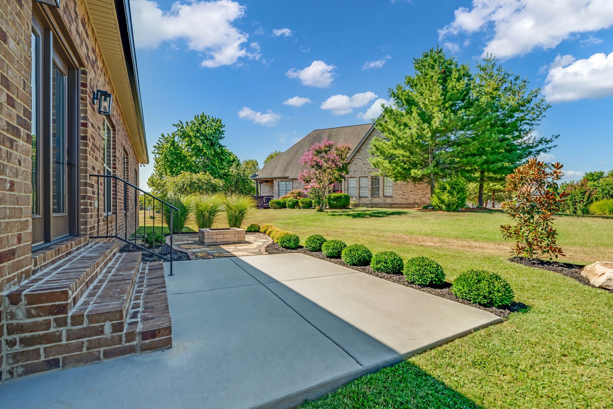 120 Augusta Trail Springfield, TN 37172 - Photo 32 of 37 a view of a street with a bench and trees