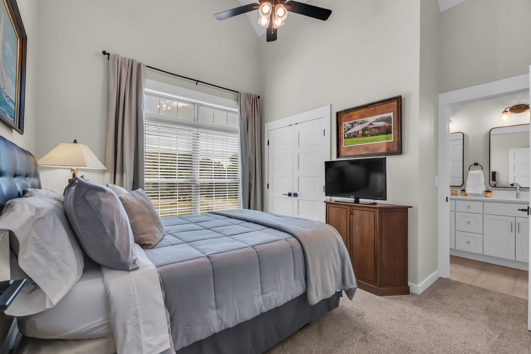 120 Augusta Trail Springfield, TN 37172 - Photo 7 of 37 a bedroom with a bed and a chandelier