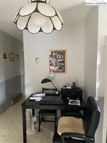 a kitchen with stainless steel appliances granite countertop a sink a stove and a wooden floors