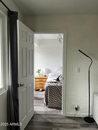 a bathroom with a mirror and a shower