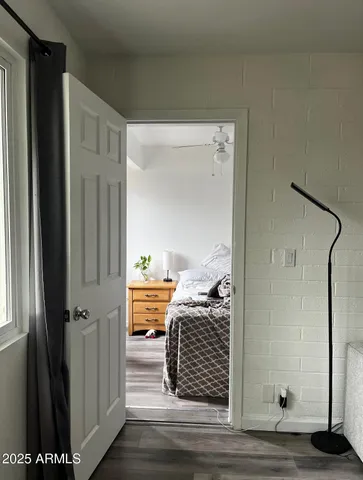 a bathroom with a mirror and a shower