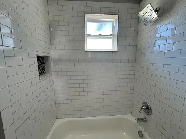 a bathroom with a bathtub