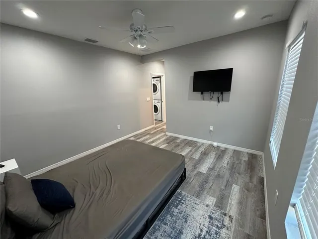 a view of a livingroom with a flat screen tv