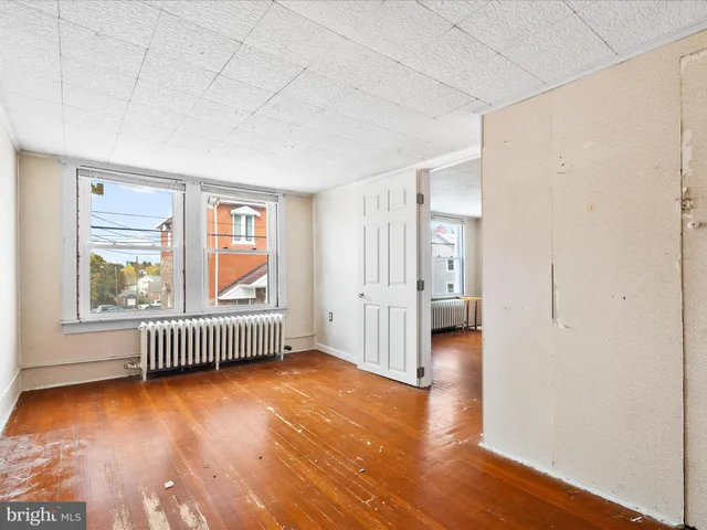 a view of livingroom with hardwood floor and window