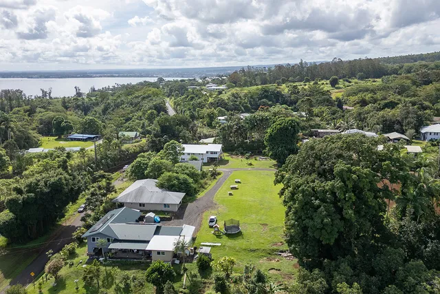 an aerial view of a house with a garden