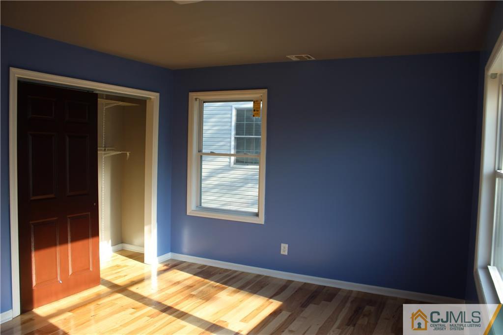 15 Kenmore Road Edison, NJ 08817 - Photo 25 of 35 a view of an empty room and window