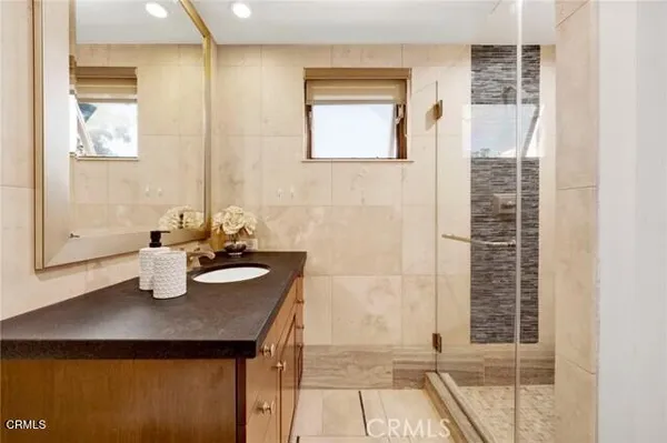 a view of a hallway with washer and dryer