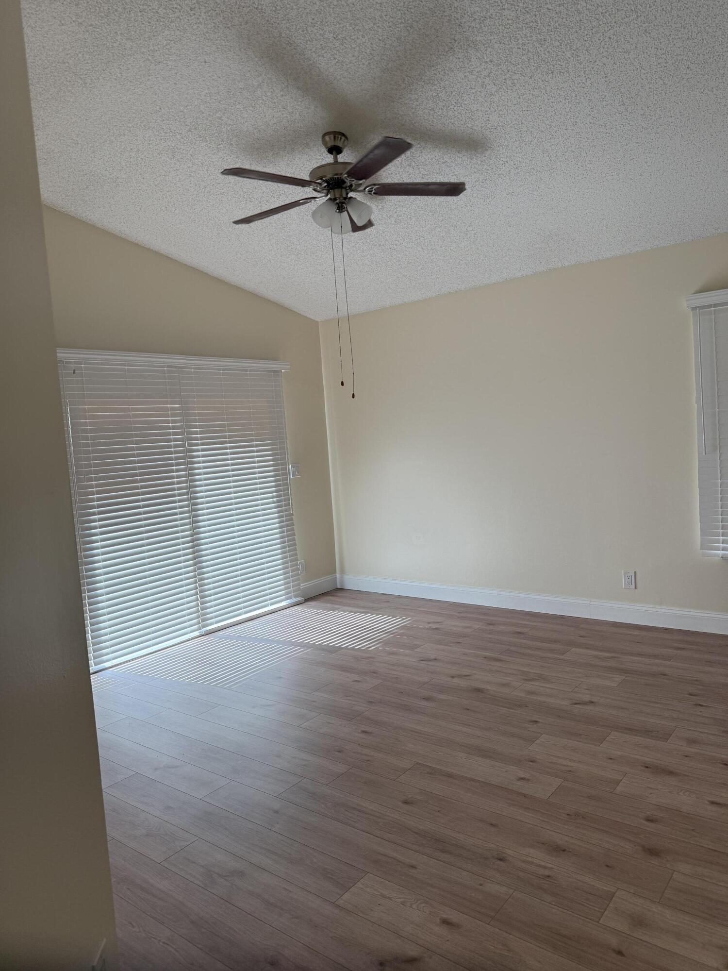 21583 Villa Nova Drive Boca Raton, FL 33433 - Photo 21 of 33 a view of an empty room with a window
