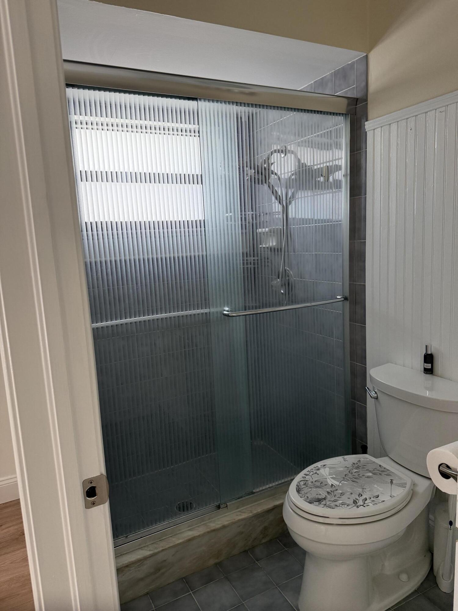 21583 Villa Nova Drive Boca Raton, FL 33433 - Photo 22 of 33 a bathroom with a toilet and a shower
