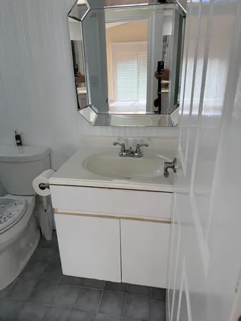 a bathroom with a sink and a toilet