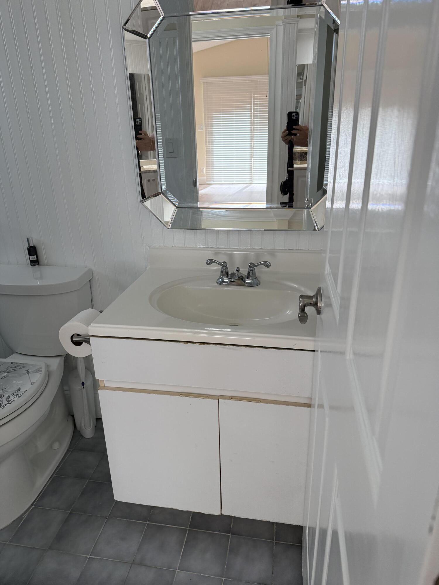 21583 Villa Nova Drive Boca Raton, FL 33433 - Photo 24 of 33 a bathroom with a sink and a toilet