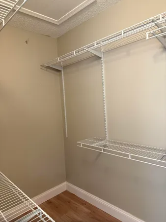 a view of a room with racks on the wall