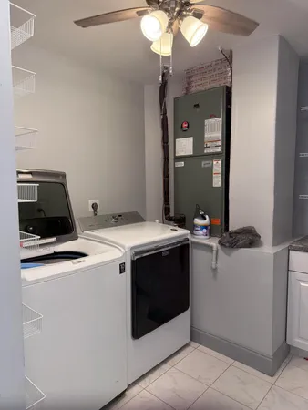 a view of cabinets and window
