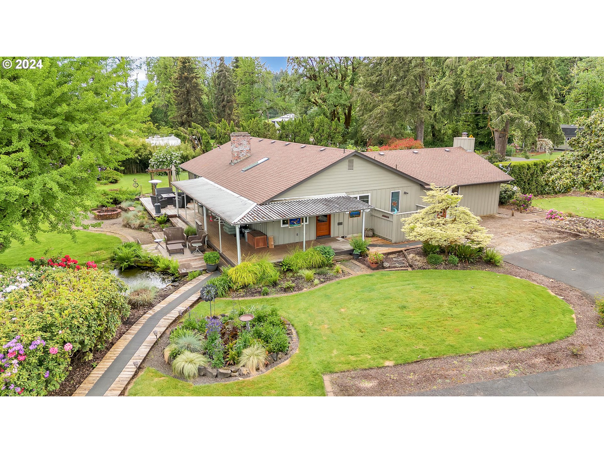 91281 Donna Road Springfield, OR 97478 - Photo 3 of 42 a view of a house with a yard and sitting area
