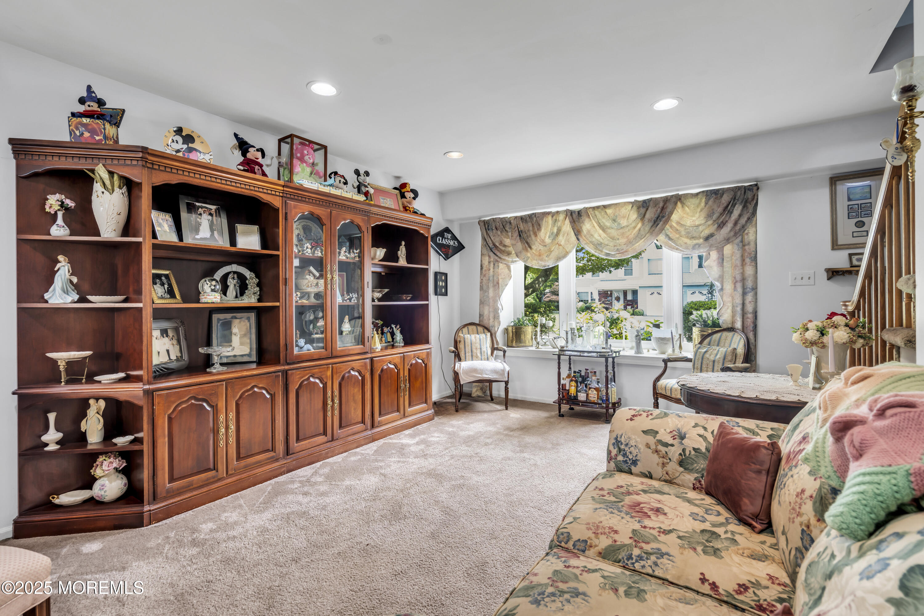 9 Yellowstone Lane Howell, NJ 07731 - Photo 13 of 37 a living room with furniture cabinets and a large window