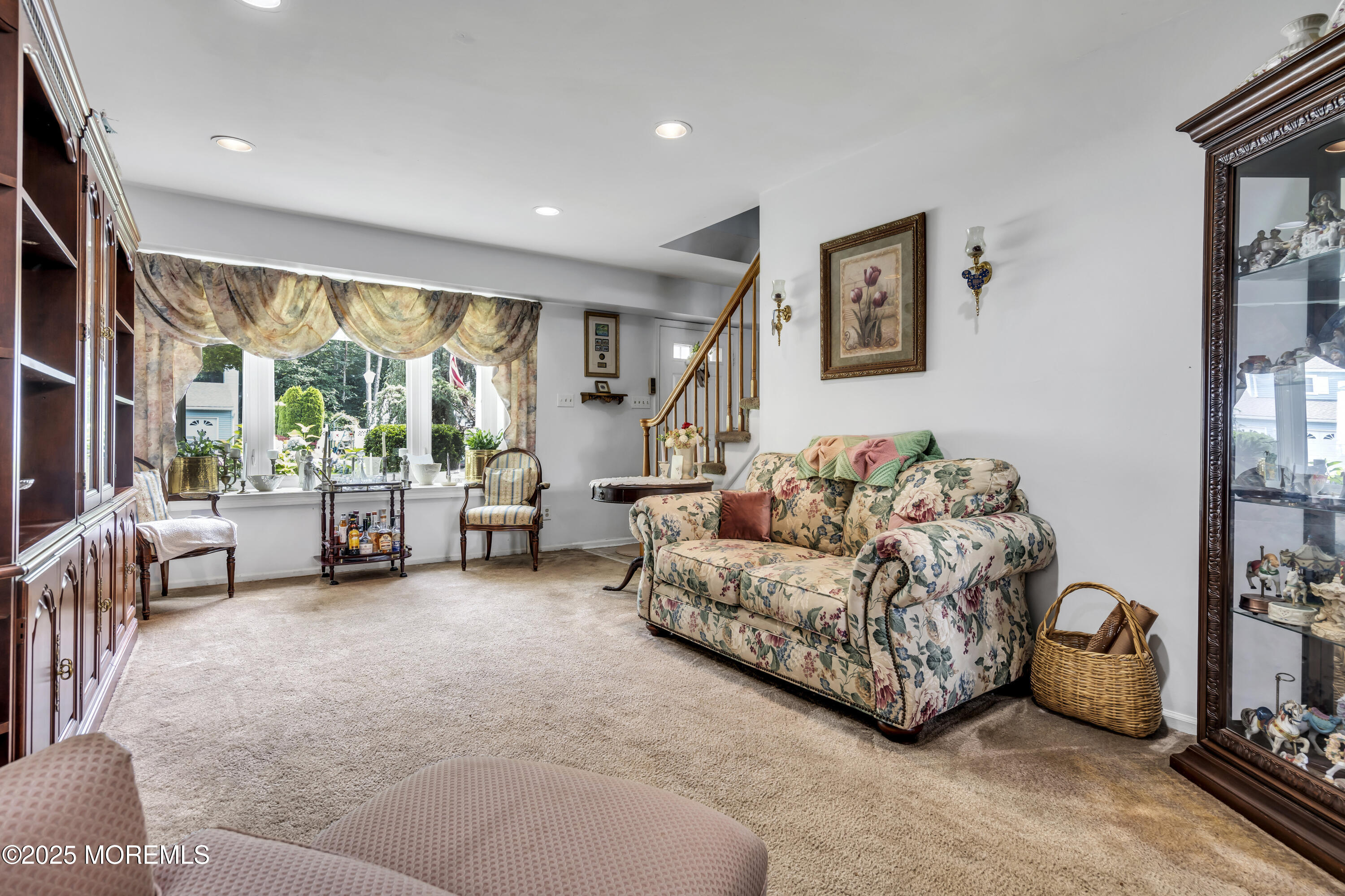 9 Yellowstone Lane Howell, NJ 07731 - Photo 14 of 37 a living room with furniture and a large window