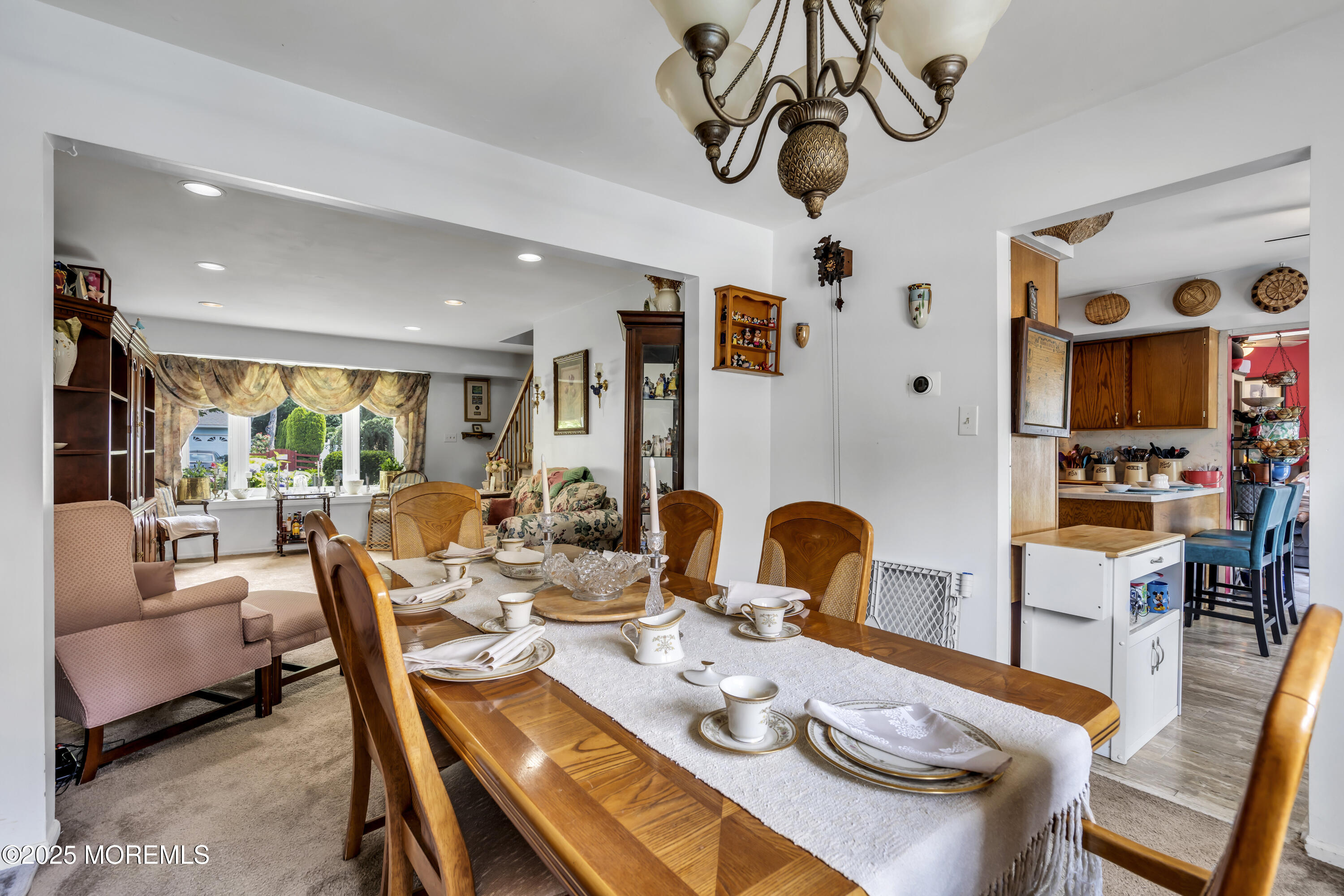 9 Yellowstone Lane Howell, NJ 07731 - Photo 19 of 37 a dining room with furniture a rug and wooden floor