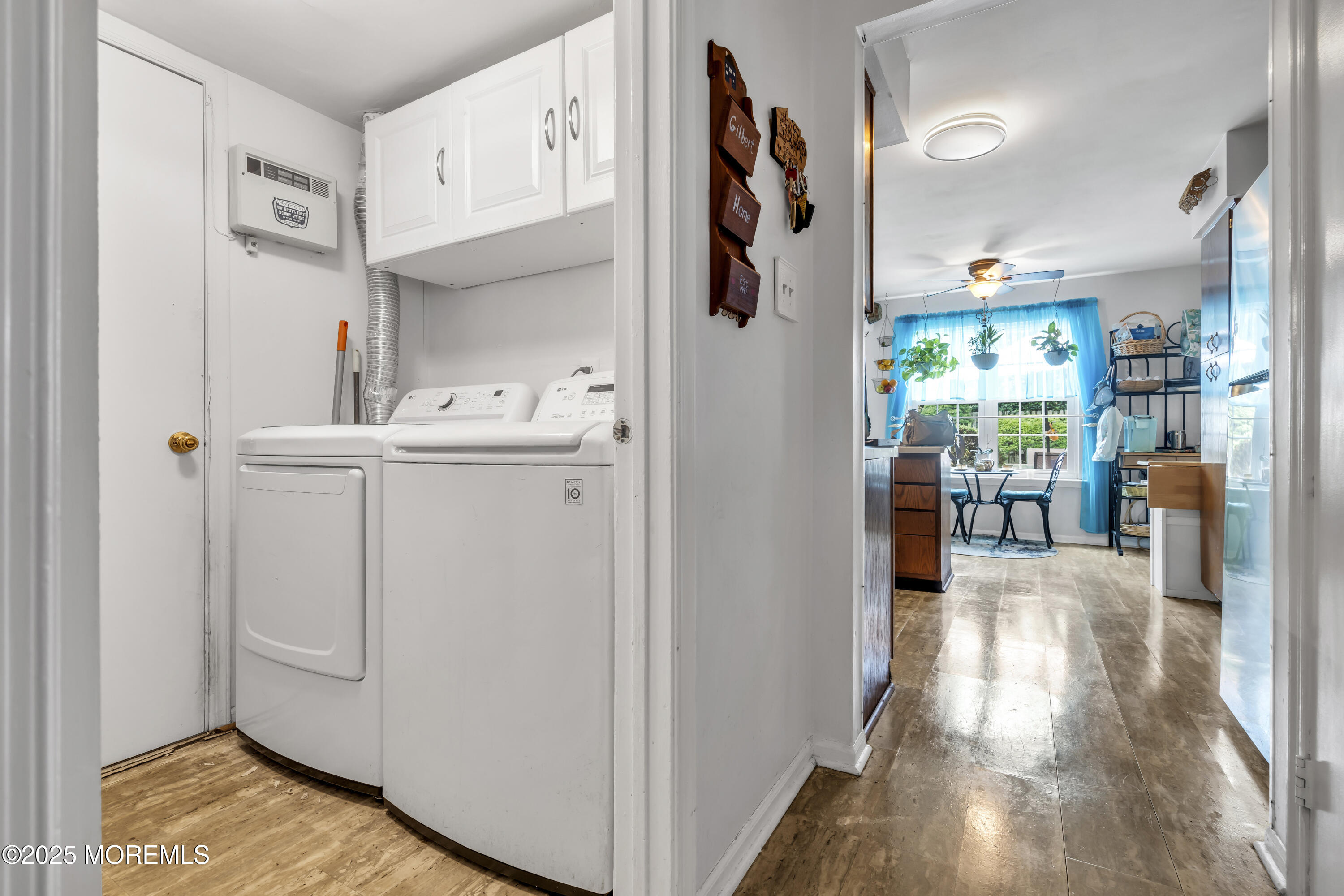 9 Yellowstone Lane Howell, NJ 07731 - Photo 21 of 37 a view of kitchen with furniture and wooden floor