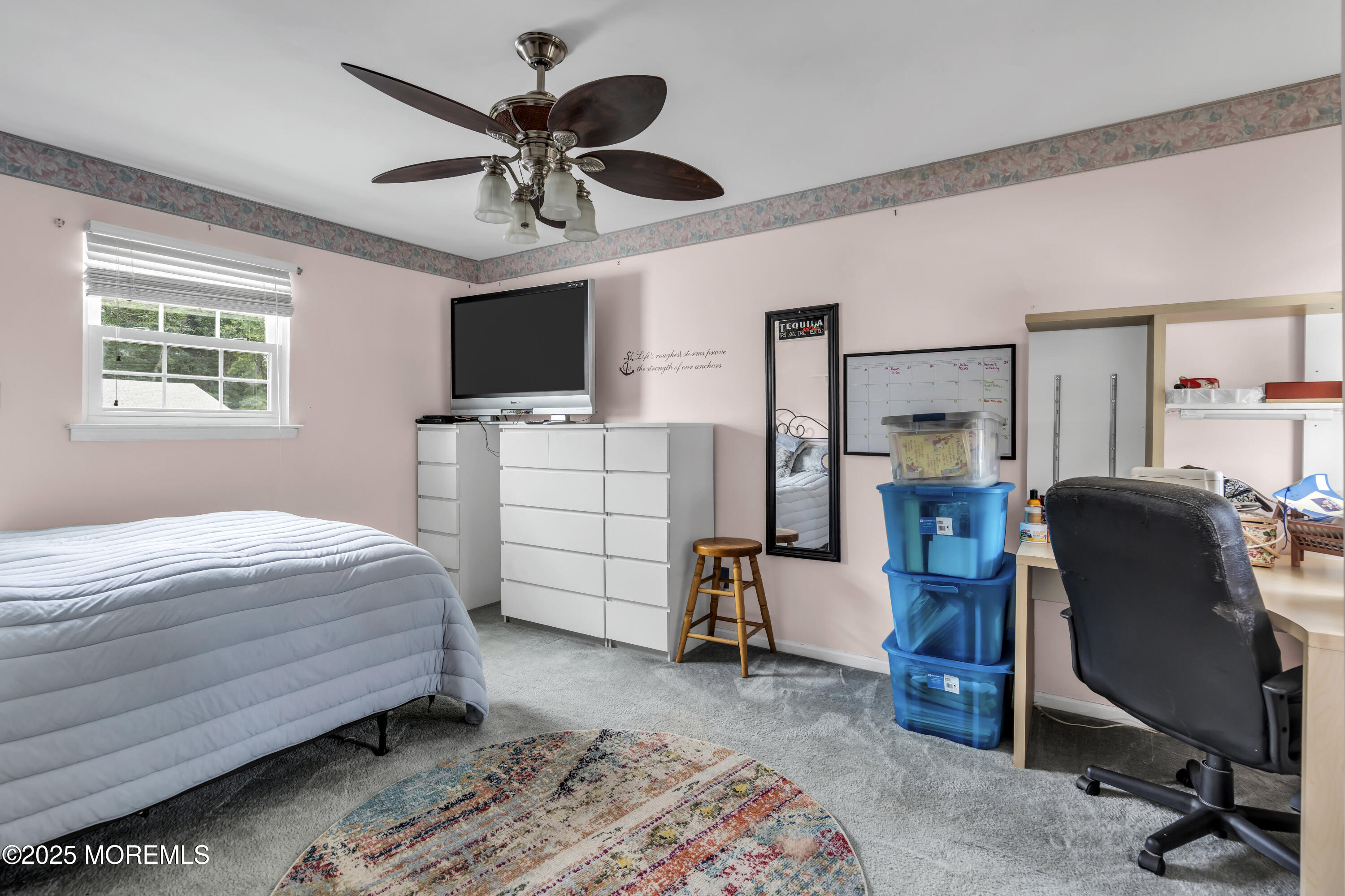 9 Yellowstone Lane Howell, NJ 07731 - Photo 28 of 37 a bedroom with a bed and a flat screen tv